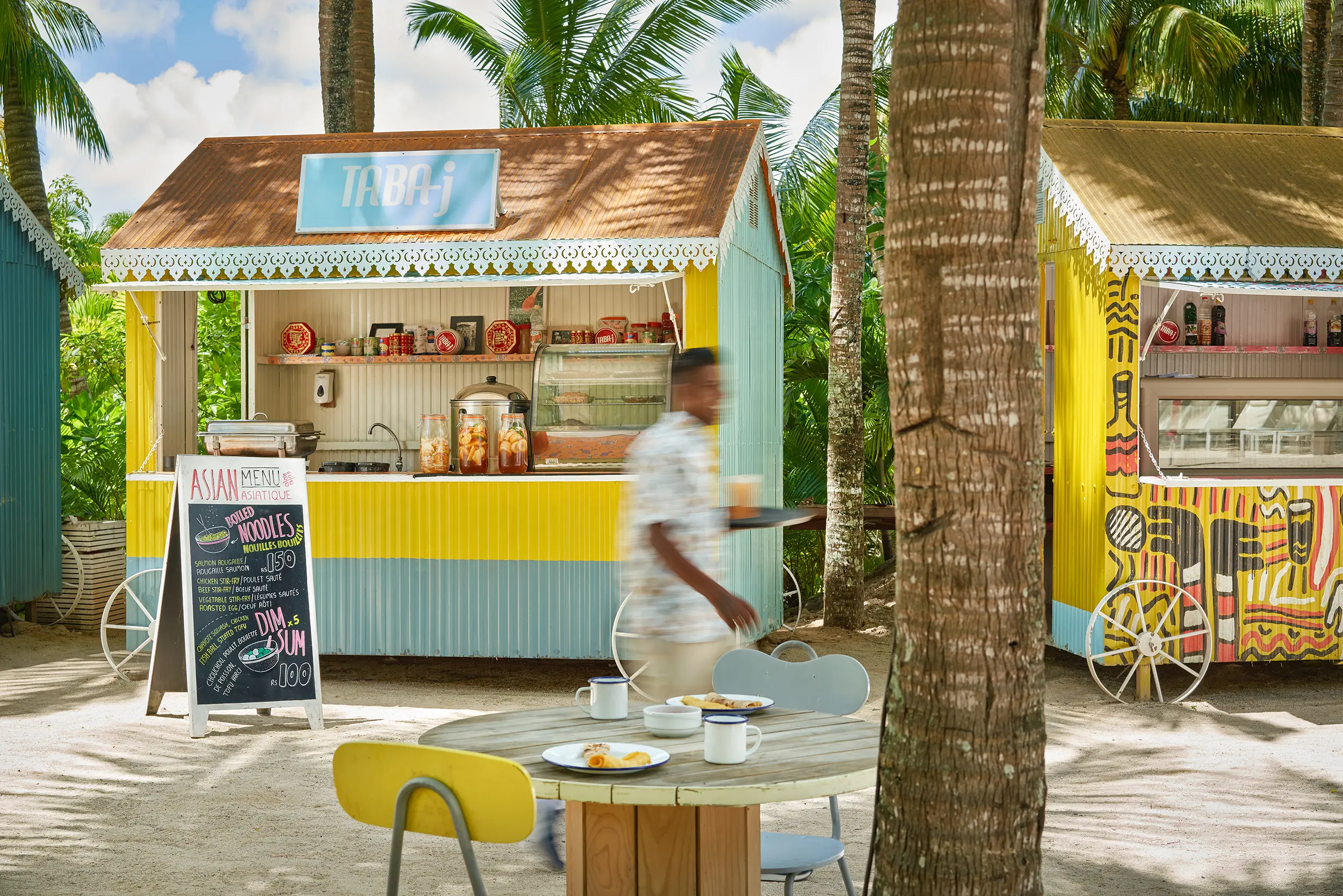 Colorful beach shack near Ravenala Attitude hotel