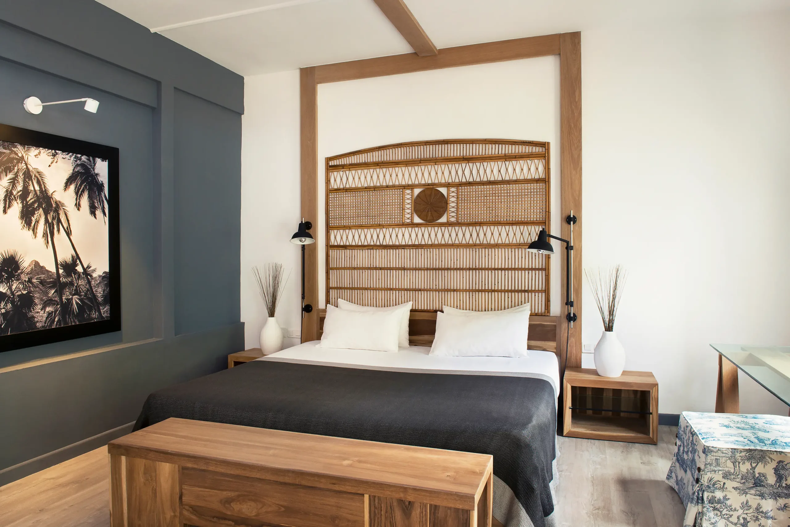 Cozy guest room with wood accents Ravenala Attitude