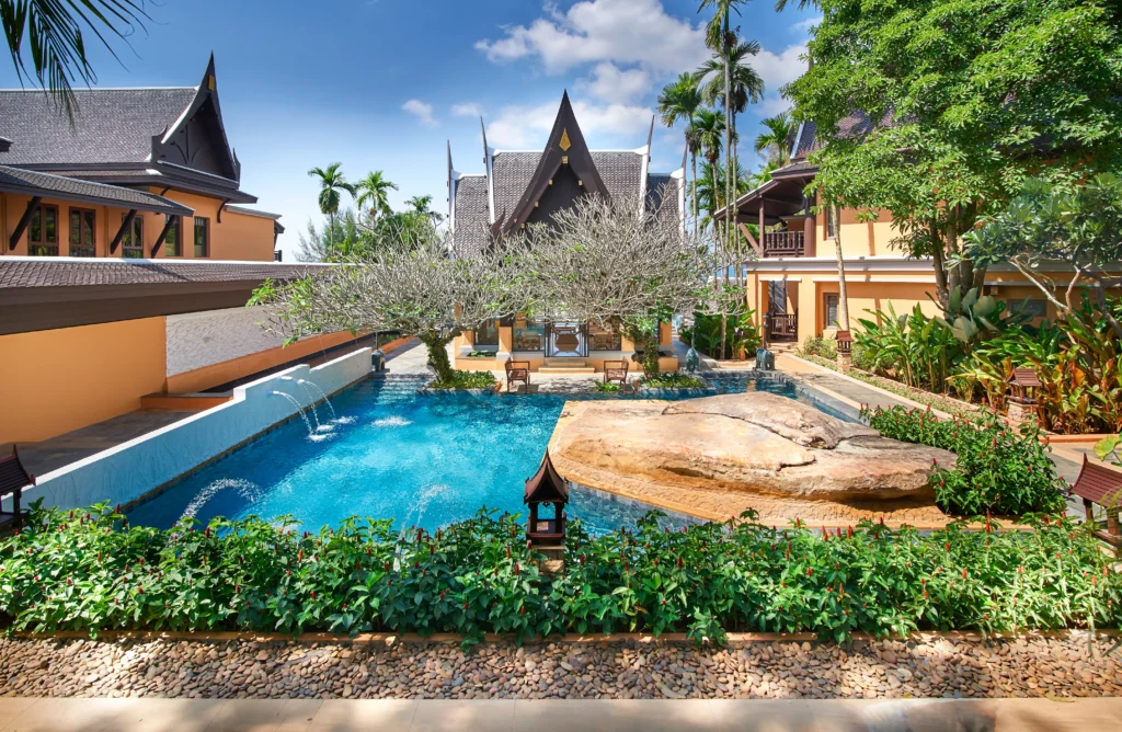 Amari Vogue Krabi swimming pool surrounded by tropical gardens