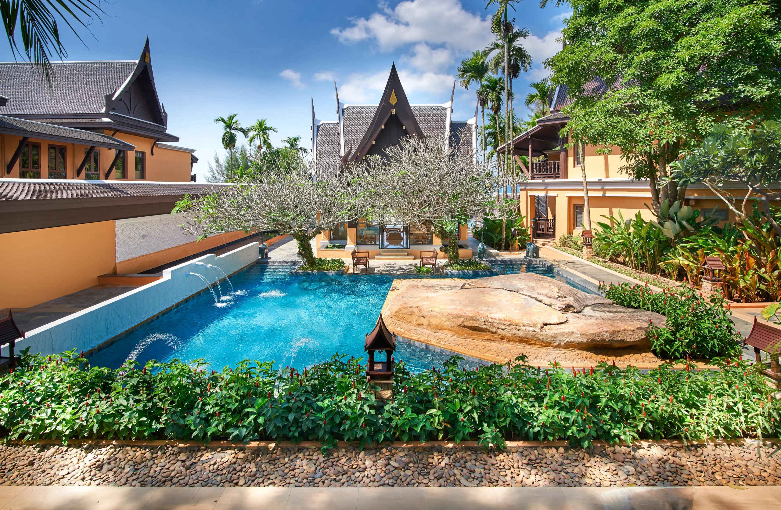 Amari Vogue Krabi swimming pool surrounded by tropical gardens