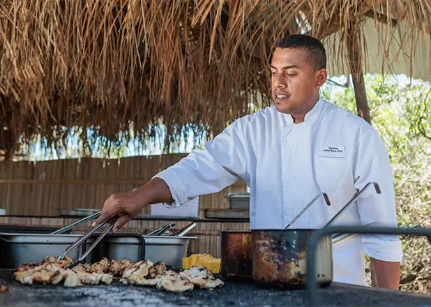 Bartender preparing cocktails at Matemwe Attitude Zanzibar bar