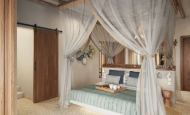 Bedroom interior at Matemwe Attitude Zanzibar with canopy bed