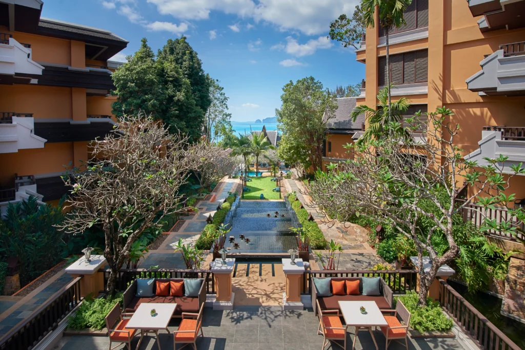 Garden dining area with lush greenery at Amari Vogue Krabi