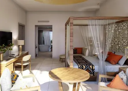 Stylish guest room interior at Diamonds Bijoux Zanzibar with canopy bed